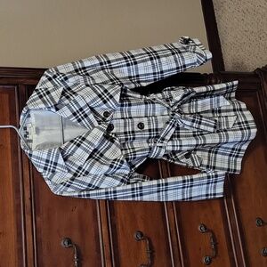 Coat, lightweight, 100% polyester. Has 2 pockets. Fits like a Medium/Large.